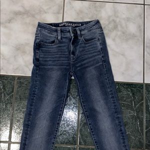 High waisted grayish blue jeans